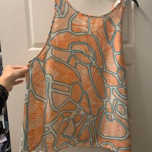 Orange and turquoise print blouse